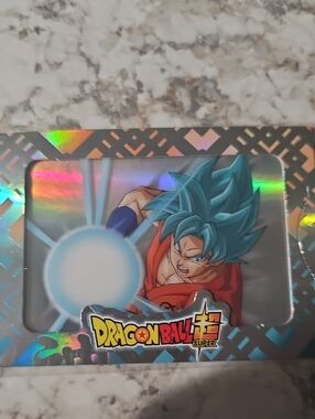 Blue Goku Collectible Card - Holographic Design